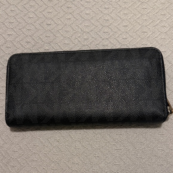 Michael Kors Textured Black Wallet - Picture 3 of 4